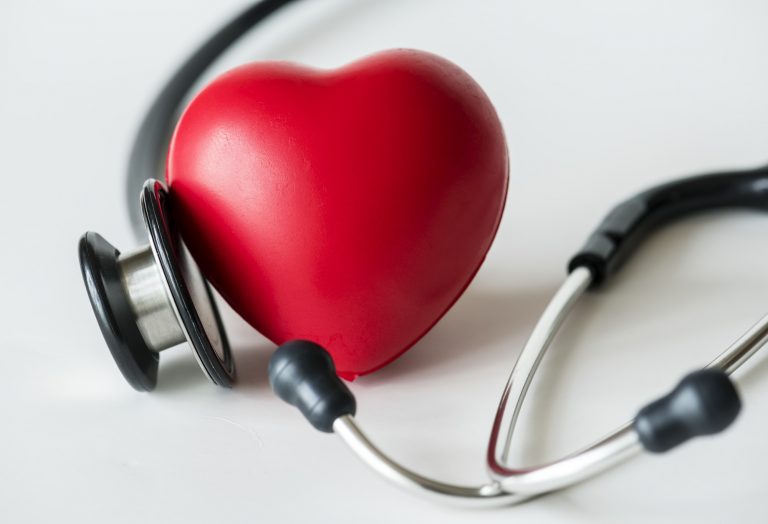 A heart shaped stress ball and a stethoscope